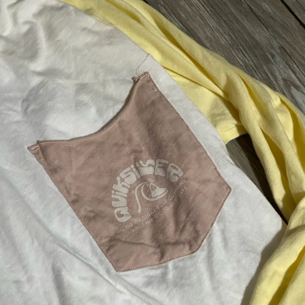 never worn quicksilver cropped long sleeve yellow, white, rust pocket, medium!